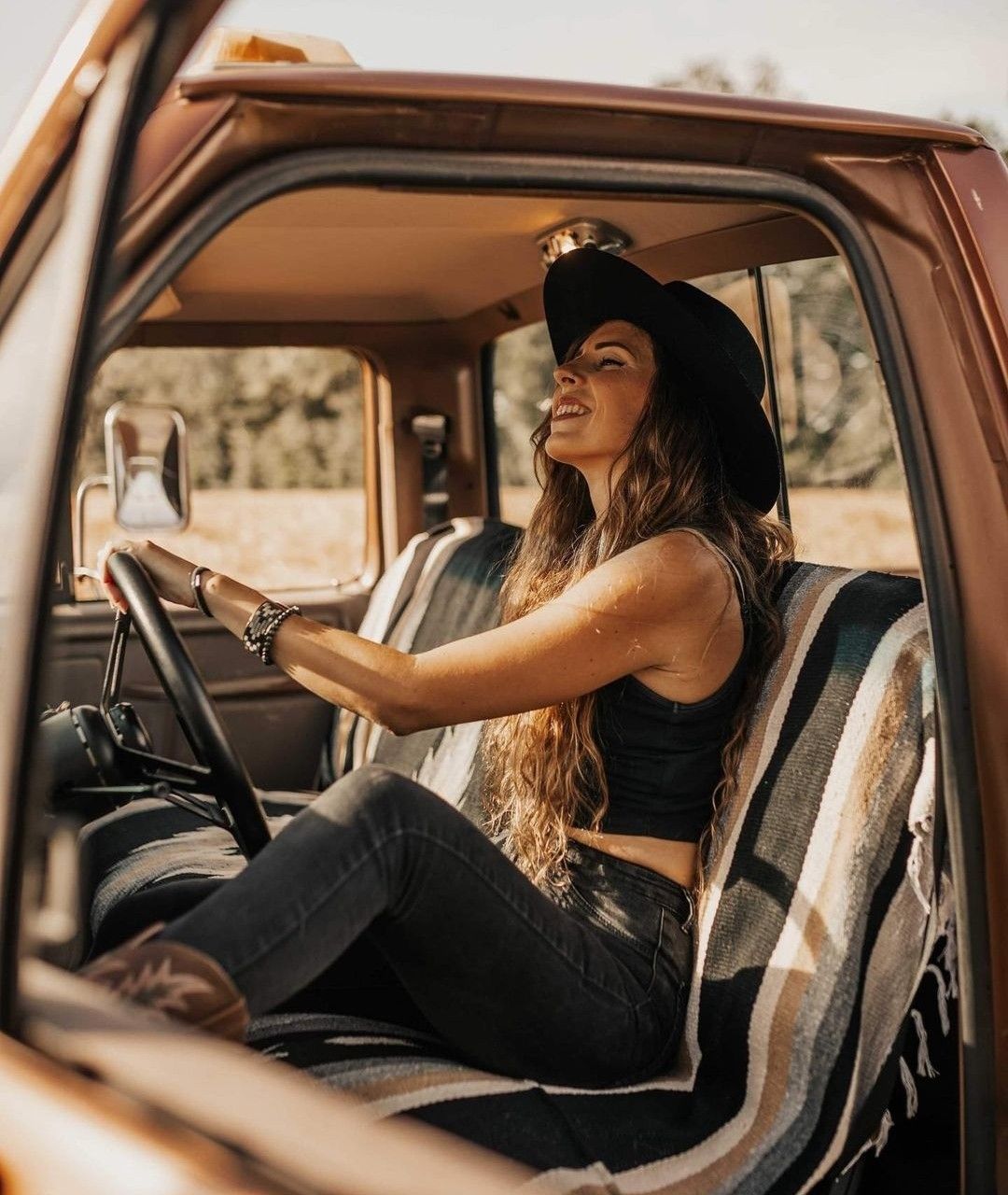 Cowboy-themed photoshoot with a vintage pickup truck